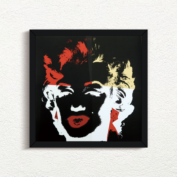 a sunday b morning print after andy warhol titled 'golden marilyn 39' in black frame. the artwork features a negative image of marilyn monroe's face on a black background, colourised in red, yellow, and white. this is a sunday b morning print for sale