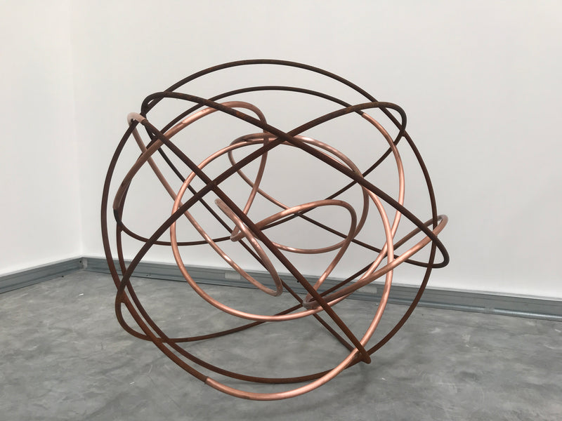 Elevate your space with Mark Beattie's Orbital XIV Sculpture, a dynamic fusion of polished copper and rusted steel. Standing at 90cm in height and measuring 90 x 90cm, this masterpiece explores the contrast between lustrous copper and weathered steel. Discover industrial elegance with this captivating sculpture, showcasing craftsmanship and unique materials in perfect harmony.