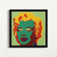 this is an image of a sunday b morning print after andy warhol titled 'marilyn 11:25' in a black frame. the artwork features a screenprint of marilyn monroe's face on a green background with bright yellow hair, green face, and red shadows. this is a sunday b morning print for sale