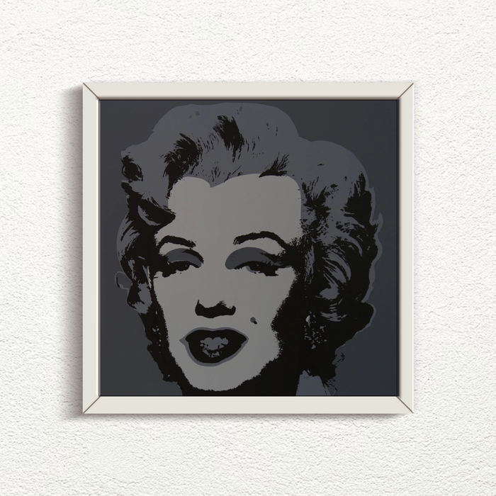 this is an image of a print by sunday b morning after andy warhol titled 'marilyn 11:24' in white frame. this artwork features a screenprint of marilyn monroe in greyscale. this is a sunday b morning print for sale.