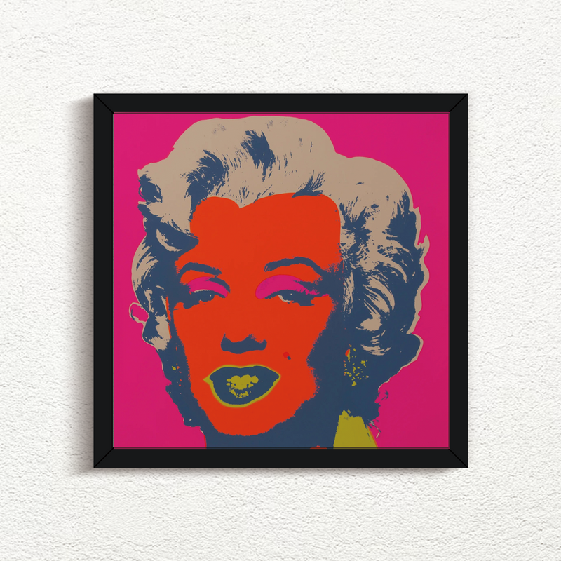 this is an image of a sunday b morning print after andy warhol, titled 'marilyn 11:22' in a black frame. the artwork features a screenprint of marilyn monroe's face in red, navy blue, yellow and beige on a hot pink background. this is a sunday b morning marilyn monroe print for sale