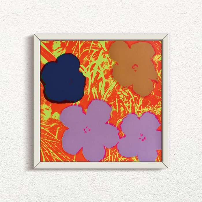 this is an image of a sunday b morning print after andy warhol, titled 'flowers 11:69' in a white frame. the artwork features an orange and yellow background with four flowers superimposed in blue, brown, and purple. this is a sunday b morning print