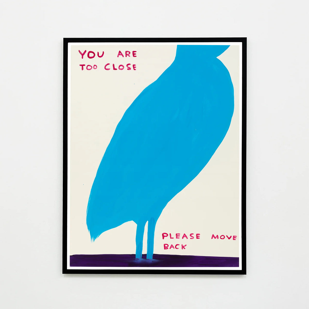 this is an image of a david shrigley artwork titled 'you are too close' in a black frame. the artwork features a very zoomed in drawing of a blue bird with its feet submerged in water. there is text stating 'YOU ARE TOO COSE PLEASE MOVE BACK'. this is a david shrigley poster for sale