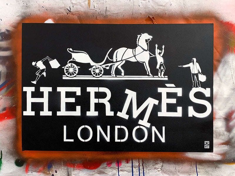 A captivating and authentic artwork by DS, "Hermes London (Black)" seamlessly blends black spray paint and hand-cut stencils to create a visually arresting piece. This unique artwork captures the essence of Hermes Street in London, a neighborhood on the verge of transformation. This exclusive piece, hand-signed by the artist, is a must-have for art collectors seeking to elevate their space with urban grit and true street art.