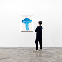 this is an image of a david shrigley artwork titled 'you win this mushroom' with a black frame on a white wall with a single spectator on the right. the artwork features a large blue painted mushroom with text stating 'YOU WIN THIS MUSHROOM IT IS POISONOUS'. this is a david shrigley print for sale