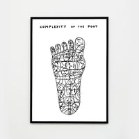 a photo of a framed art print by david shrigley, depicting a foot made out of doodled smiley faces and swirls, and text at the top of the page stating 'COMPLEXITY OF THE FOOT'. buy david shrigley prints, david shrigley art, david shrigley prints, david shrigley art prints, david shrigley for sale uk, david shrigley posters, shrigley posters, shrigley prints