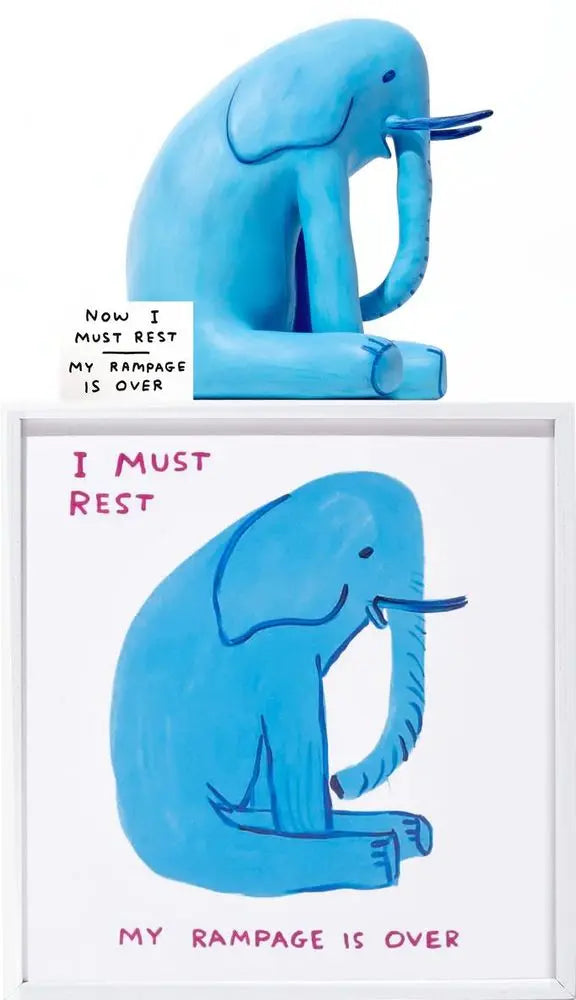 photo of a david shrigley sculpture sitting on top of a david shrigley print. the print features a blue elephant with the text 'I MUST REST MY RAMPAGE IS OVER'. the sculpture is a 3d depiction of the same elephant. Buy David Shrigley, David Shrigley Prints, David Shrigley art, David Shrigley poster, david shrigley art prints