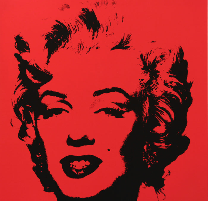 an image of an artwork by andy warhol titled 'Golden Marilyn 43'. the artwork features a black stencilled image of the face of marilyn monroe on a red background. this is a sunday b morning print