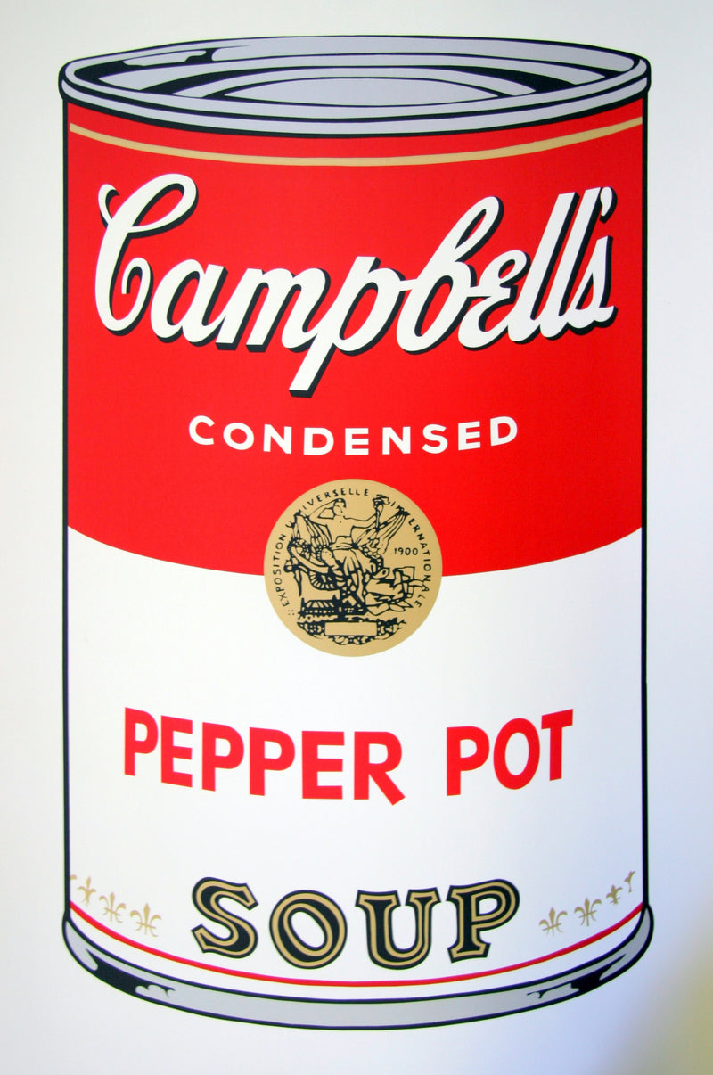 image features an andy warhol artwork titled 'campbells pepper pot soup'. the artwork features a large image of a soup can in a cartoon-like, pop art style, featuring the colours red, grey, black, white, and gold. the can reads 'campbells condensed pepper pot soup'. this is a sunday b morning print