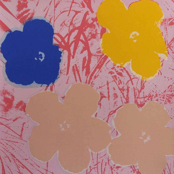 this is an image of a sunday b morning print after the andy warhol artwork 'flowers 11:70'. the artwork features a pink grassy background and four flowers, in blue, yellow, and cream colours. this is a sunday b morning print for sale