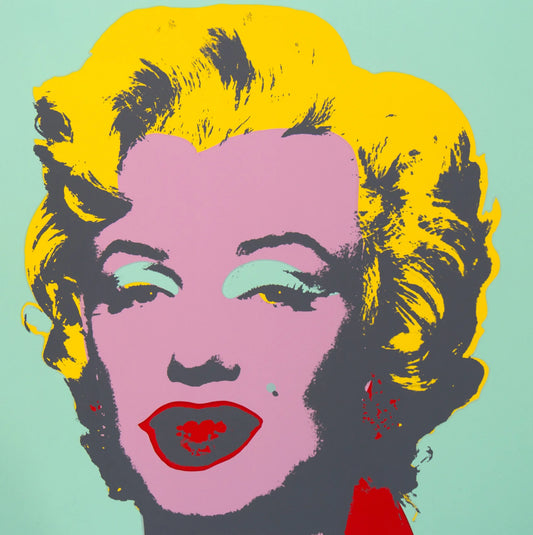 this is an image of a sunday b morning print after andy warhol titled 'marilyn 11:23'. the artwork features a screenprint of marilyn monroe's face on a teal background, with bright yellow hair, a lilac face, and red lips. this is a sunday b morning print for sale