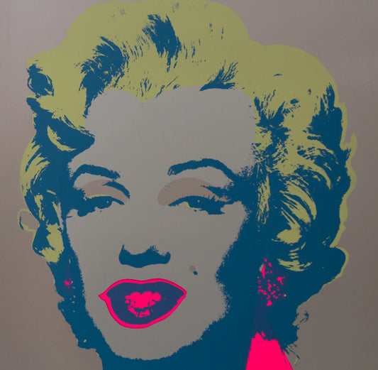 this is an image of a sunday b morning print after andy warhol titled 'marilyn 11:26'. the artwork features a screenprint of marilyn monroe's face on a grey background with yellow hair and fuchsia lips with navy blue shadows. this is a sunday b morning print for sale.