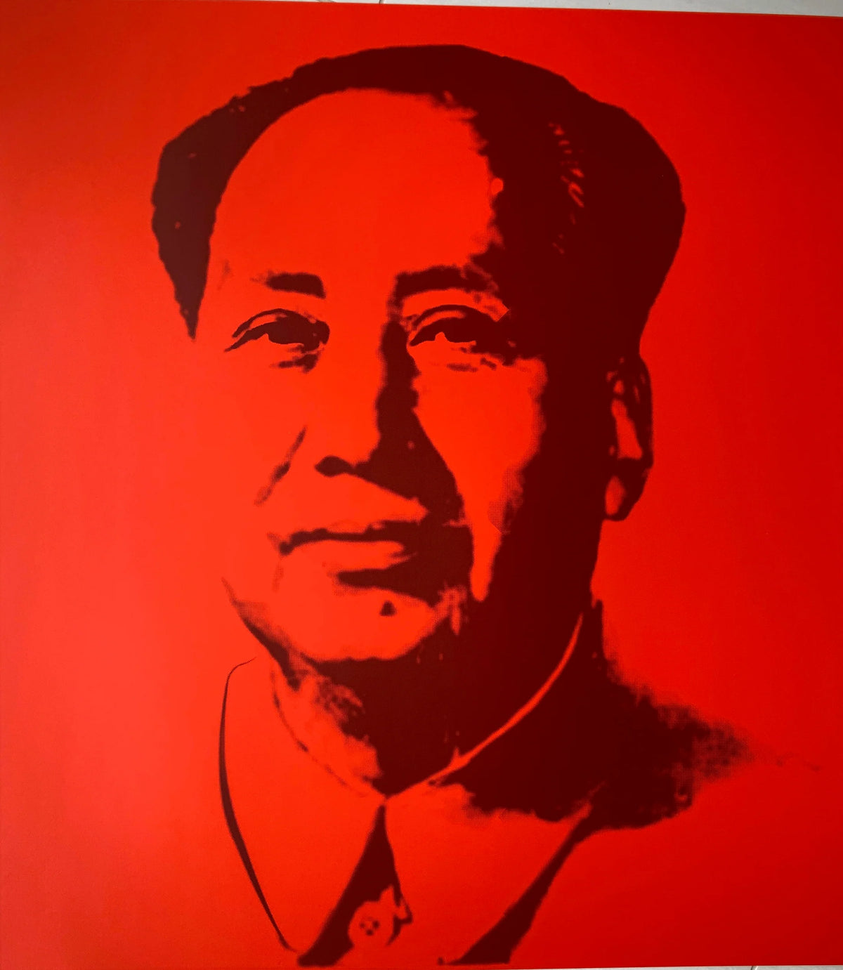 this is an image of a sunday b morning print after an andy warhol artwork titled 'mao red'. the artwork features a screenprint of general mao on a red background with black shadows only. this is a sunday b morning print for sale