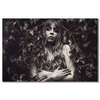 100 x 150 cm canvas from Tank petrol featiuring a woman  with a disconcerted look on a bacground of leaves 