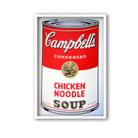 an image of an andy warhol artwork titled 'campbells chicken noodle soup' in a white frame. the image features a cartoon-like, pop art depiction of a soup can, with the text 'Campbell's Condensed CHicken Noodle Soup'. this is a sunday b morning print