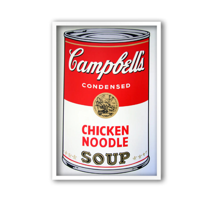 an image of an andy warhol artwork titled 'campbells chicken noodle soup' in a white frame. the image features a cartoon-like, pop art depiction of a soup can, with the text 'Campbell's Condensed CHicken Noodle Soup'. this is a sunday b morning print