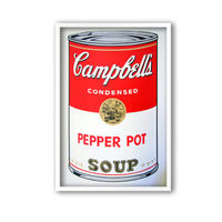 image features an andy warhol artwork titled 'campbells pepper pot soup' in a white frame. the artwork features a large image of a soup can in a cartoon-like, pop art style, featuring the colours red, grey, black, white, and gold. the can reads 'campbells condensed pepper pot soup'. this is a sunday b morning print