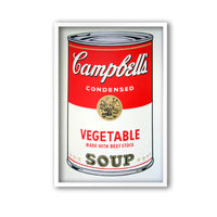 image of artwork by andy warhol titled 'campbells vegetable soup', in a white frame. The image features a large, cartoon-like, art pop depiction of a soup tin, printed in red, gold, grey, white, and black colours. the tin reads 'campbells condensed vegetable made with beef stock soup'. this is a sunday b morning print