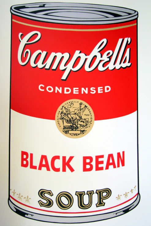 this is an image of a sunday b morning print after andy warhol titled 'black bean soup'. the artwork features a screenprint of a campbell's soup tin in the colours gold, red, white, silver, and black. this is a sunday b morning print for sale