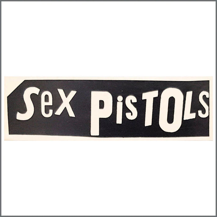 An image of an original sex pistols promotional poster, artwork by jamie reid. the artwork features ransom lettering stating SEX PISTOLS, in white text on a black background.