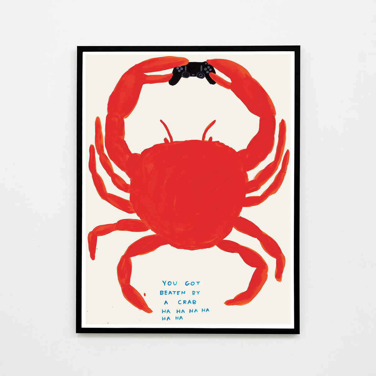 this is an image of an artwork by david shrigley titled 'you got beaten by a crab' in a black frame. the artwork features a large orange crab holding a playstation controller, with blue text at the bottom stating 'YOU GOT BEATEN BY A CRAB HA HA HA HA HA HA'. this is a david shrigley poster for sale